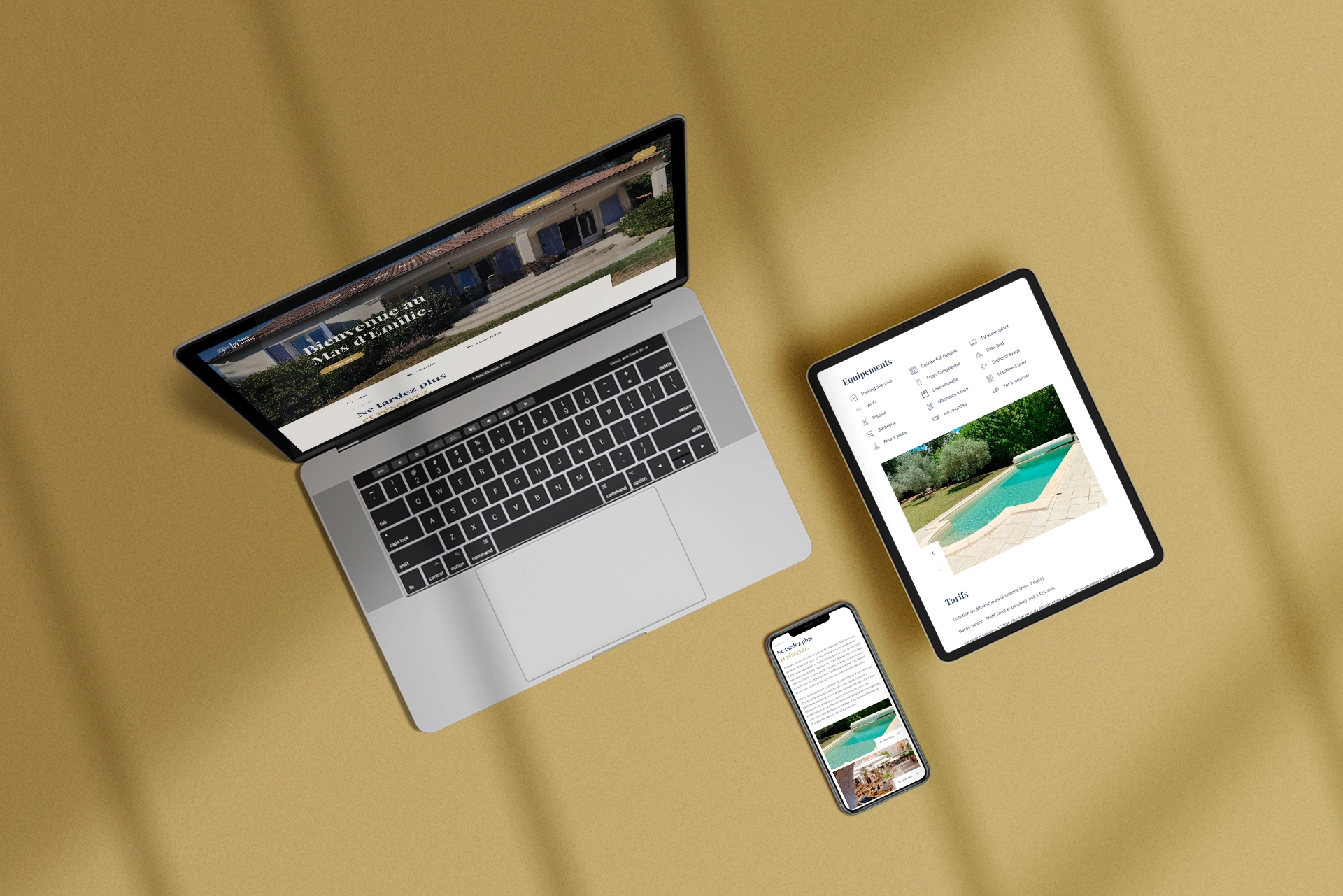 Photo d'un mockup d'un laptop, d'une tablette et d'un smartphone avec le site du Mas d'Emilie